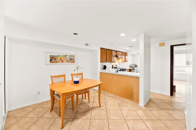 5715 Baltimore Dr Unit 35, La Mesa, CA 91942 - dining area with light tile patterned floors, recessed lighting, and baseboards