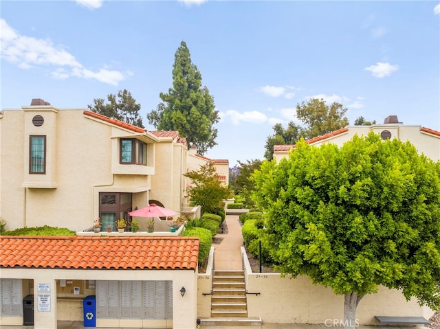 5715 Baltimore Dr Unit 35, La Mesa, CA 91942 - view of property featuring stairs