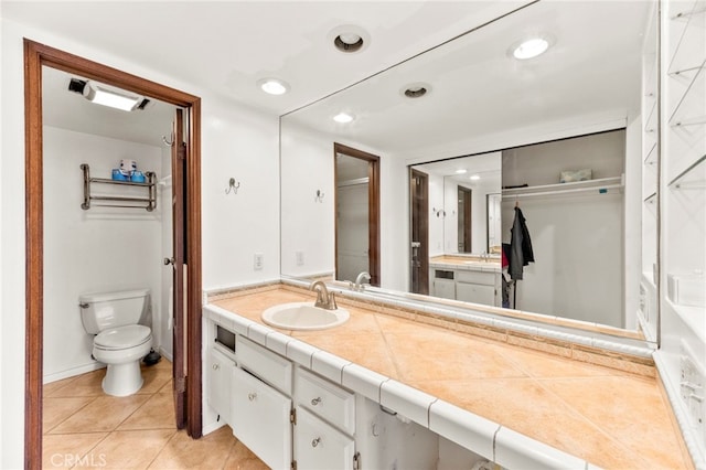 5715 Baltimore Dr Unit 35, La Mesa, CA 91942 - full bathroom featuring vanity, toilet, tile patterned flooring, and recessed lighting