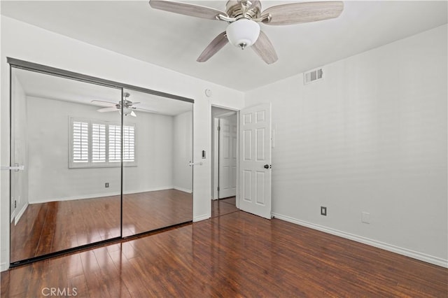 26966 Flo Ln Unit 318, Canyon Country, CA 91351 - unfurnished bedroom with a closet, wood finished floors, and a ceiling fan