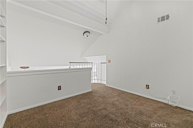 26966 Flo Ln Unit 318, Canyon Country, CA 91351 - carpeted spare room featuring lofted ceiling and baseboards