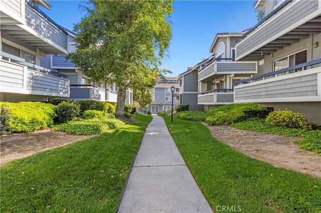 26966 Flo Ln Unit 318, Canyon Country, CA 91351 - view of property's community with a yard