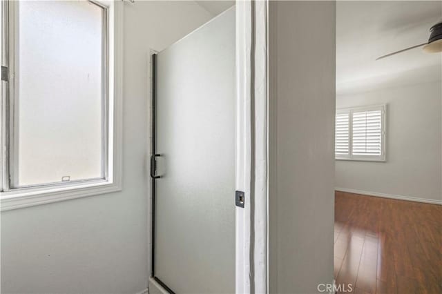 26966 Flo Ln Unit 318, Canyon Country, CA 91351 - corridor featuring wood finished floors and baseboards