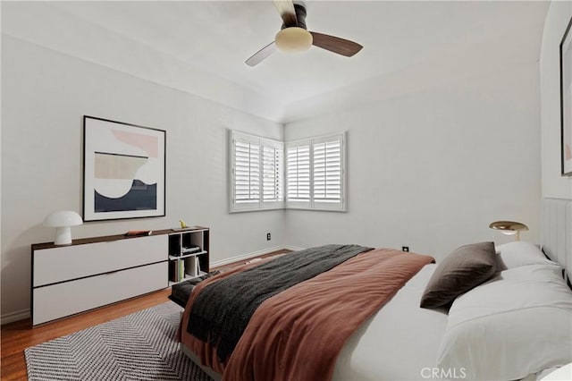 26966 Flo Ln Unit 318, Canyon Country, CA 91351 - bedroom featuring wood finished floors and ceiling fan