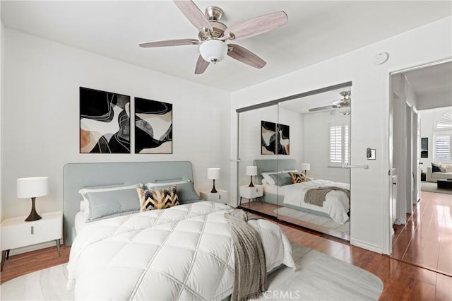 26966 Flo Ln Unit 318, Canyon Country, CA 91351 - bedroom featuring wood finished floors, a closet, and ceiling fan