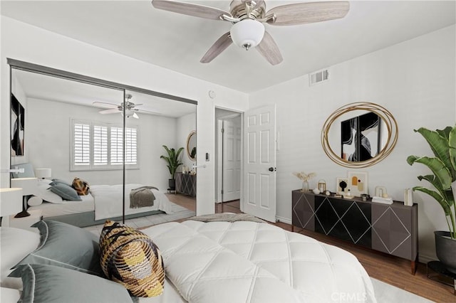 26966 Flo Ln Unit 318, Canyon Country, CA 91351 - bedroom featuring a closet, wood finished floors, and a ceiling fan