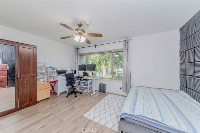 5493 Twin Lakes Dr, Cypress, CA 90630 - bedroom with a desk, light wood finished floors, and a ceiling fan