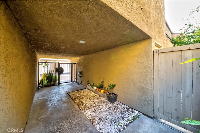 5493 Twin Lakes Dr, Cypress, CA 90630 - property entrance with stucco siding and a gate