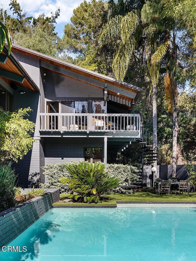 140 Belday Rd, Pasadena, CA 91105 - back of property with stairs and an outdoor pool