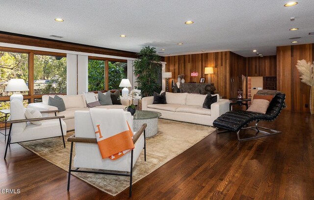 140 Belday Rd, Pasadena, CA 91105 - living area featuring wood walls, a textured ceiling, wood finished floors, and recessed lighting