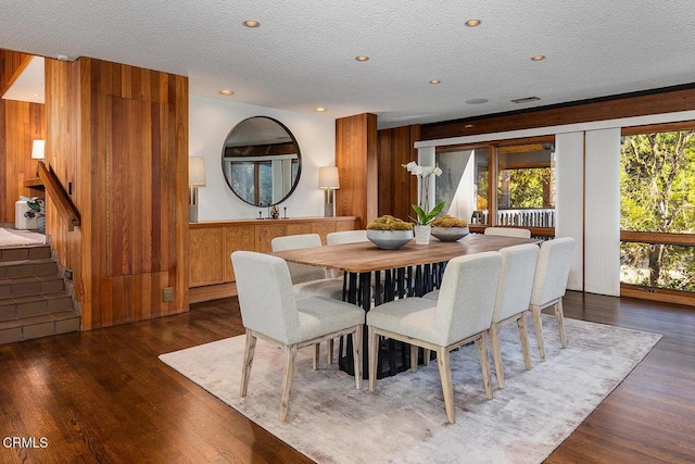 140 Belday Rd, Pasadena, CA 91105 - dining room featuring wood walls, stairs, wood finished floors, and a textured ceiling
