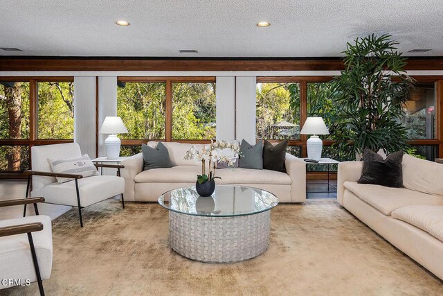 140 Belday Rd, Pasadena, CA 91105 - carpeted living area featuring plenty of natural light, a textured ceiling, and recessed lighting