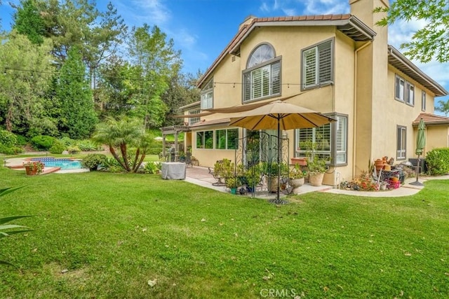 2279 Calle Liseta, San Dimas, CA 91773 - back of property featuring a patio, stucco siding, a yard, and an outdoor pool