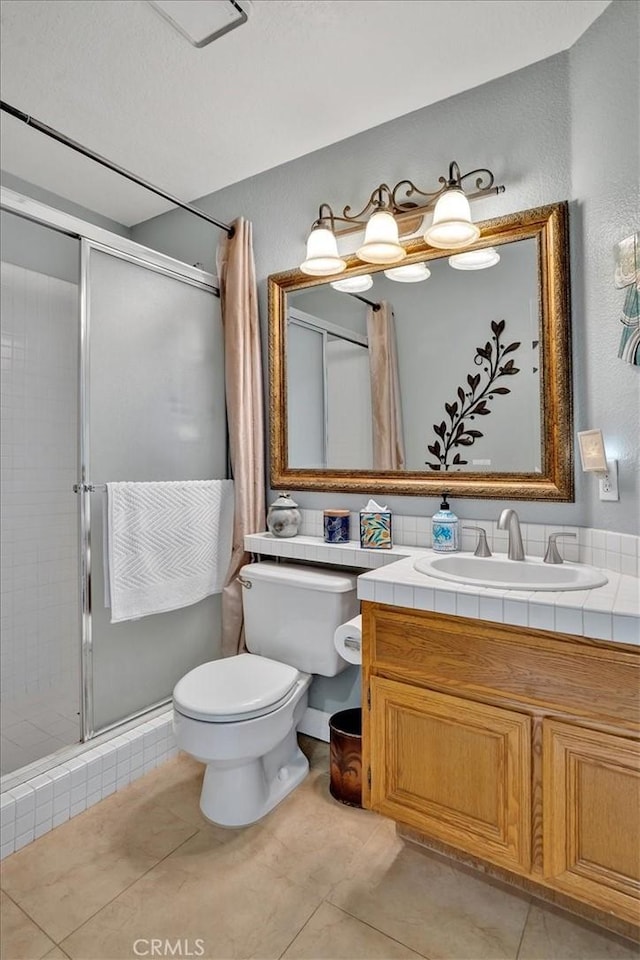 2279 Calle Liseta, San Dimas, CA 91773 - full bathroom featuring a stall shower, vanity, and tile patterned floors
