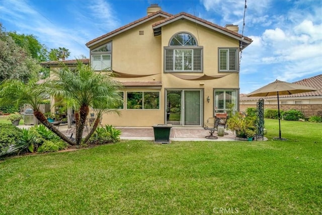 2279 Calle Liseta, San Dimas, CA 91773 - rear view of property with a chimney, a patio, and stucco siding