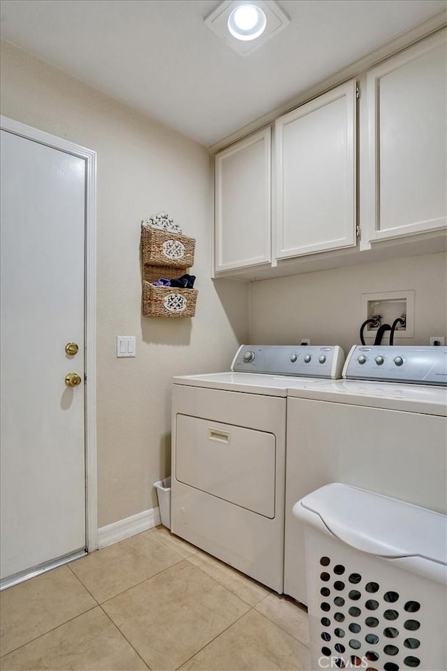 2279 Calle Liseta, San Dimas, CA 91773 - laundry area with washer and clothes dryer, cabinet space, and light tile patterned flooring