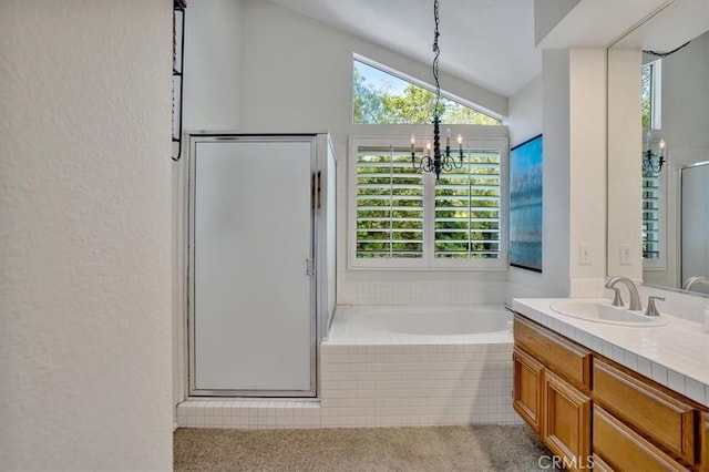 2279 Calle Liseta, San Dimas, CA 91773 - bathroom with vanity, a garden tub, a stall shower, a chandelier, and lofted ceiling