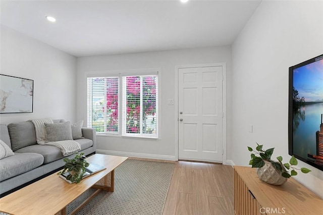 15216 Daphne Ave, Gardena, CA 90249 - living room featuring light wood finished floors, recessed lighting, and baseboards