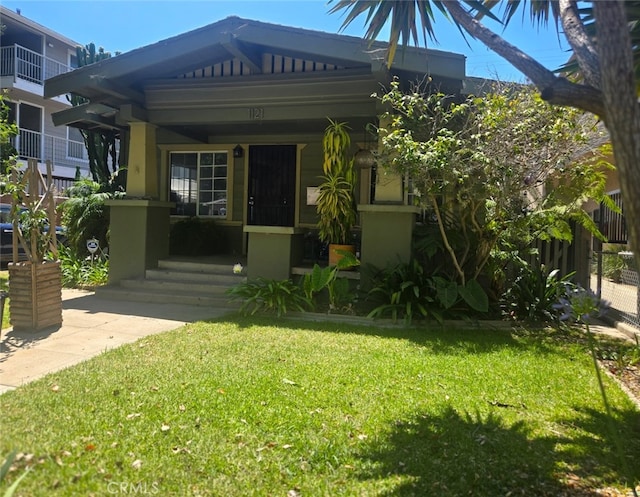 1121 Gladys Ave, Long Beach, CA 90804 - view of front of home with a front yard and stucco siding
