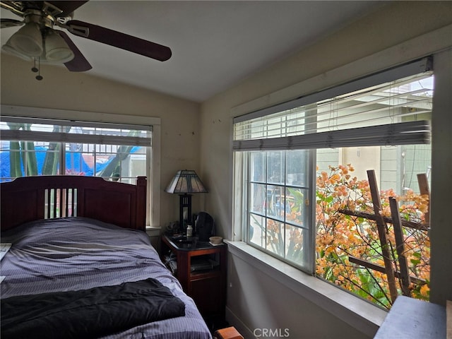 1121 Gladys Ave, Long Beach, CA 90804 - bedroom with lofted ceiling, multiple windows, and a ceiling fan