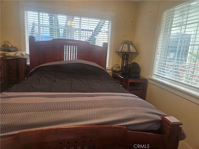 1121 Gladys Ave, Long Beach, CA 90804 - bedroom featuring multiple windows