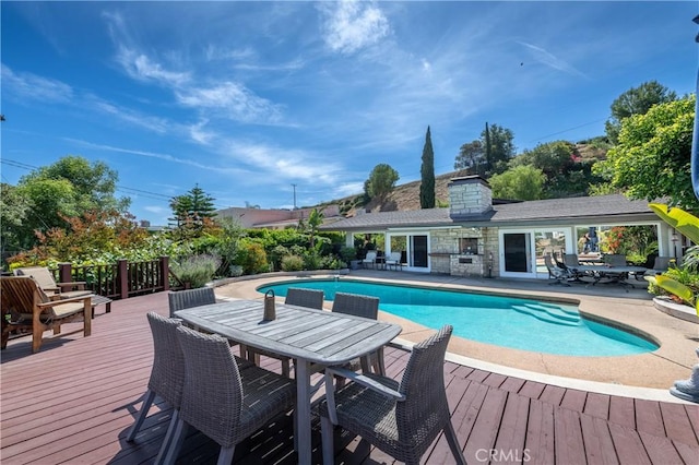 4314 Coronet Dr, Encino, CA 91316 - outdoor pool featuring outdoor dining space, a deck, a patio, and an outdoor structure