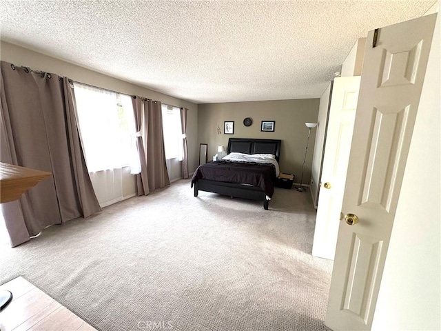 3381 Bandit Cir, Huntington Beach, CA 92649 - bedroom with a textured ceiling and carpet flooring