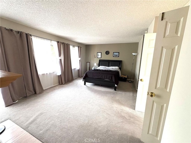 3381 Bandit Cir, Huntington Beach, CA 92649 - carpeted bedroom with a textured ceiling