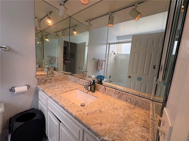3381 Bandit Cir, Huntington Beach, CA 92649 - bathroom with rail lighting and vanity
