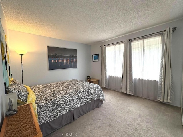 3381 Bandit Cir, Huntington Beach, CA 92649 - bedroom featuring carpet flooring and a textured ceiling