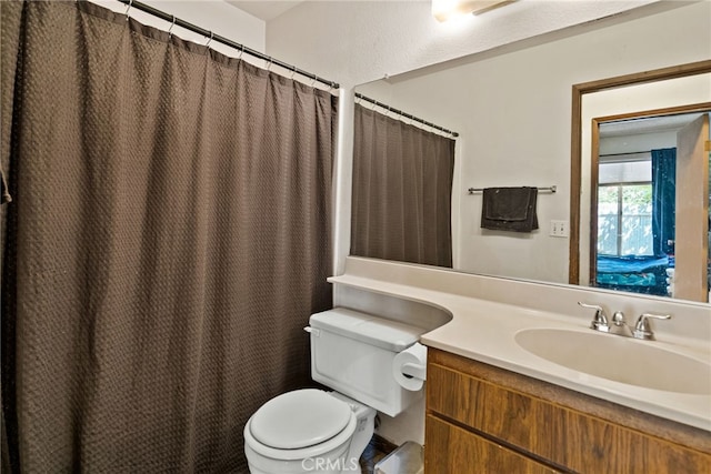 4271 Baggett Dr, Riverside, CA 92505 - bathroom featuring toilet, vanity, and a shower with curtain