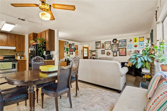 4271 Baggett Dr, Riverside, CA 92505 - dining room featuring a textured ceiling and a ceiling fan