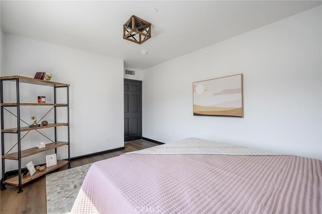 446 W Stocker St Unit 11, Glendale, CA 91202 - bedroom featuring wood finished floors and baseboards