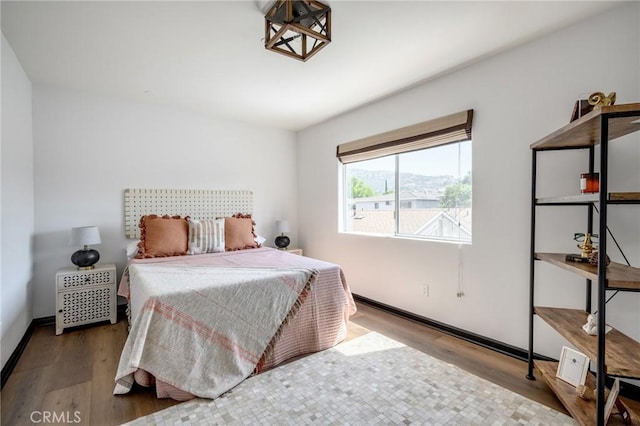 446 W Stocker St Unit 11, Glendale, CA 91202 - bedroom featuring wood finished floors and baseboards