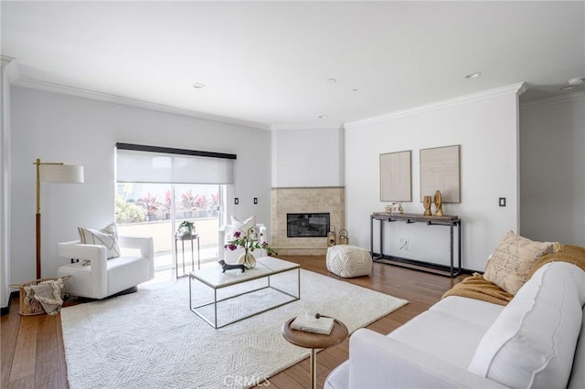 446 W Stocker St Unit 11, Glendale, CA 91202 - living area featuring wood finished floors, crown molding, a tile fireplace, and recessed lighting