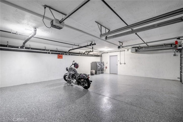 446 W Stocker St Unit 11, Glendale, CA 91202 - garage with a garage door opener and concrete block wall