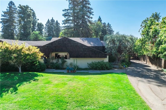 3715 W Birch Ave, Fresno, CA 93711 - view of front facade with a gate and driveway