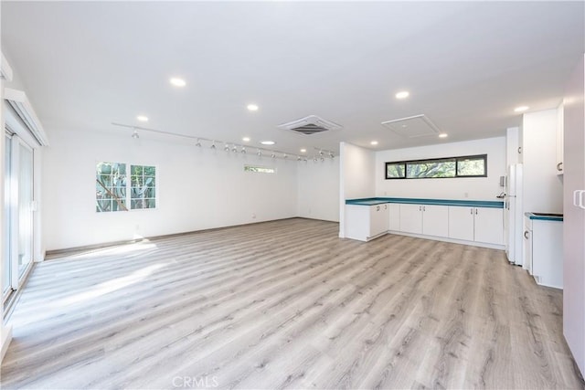 3715 W Birch Ave, Fresno, CA 93711 - unfurnished living room with recessed lighting and light wood-type flooring