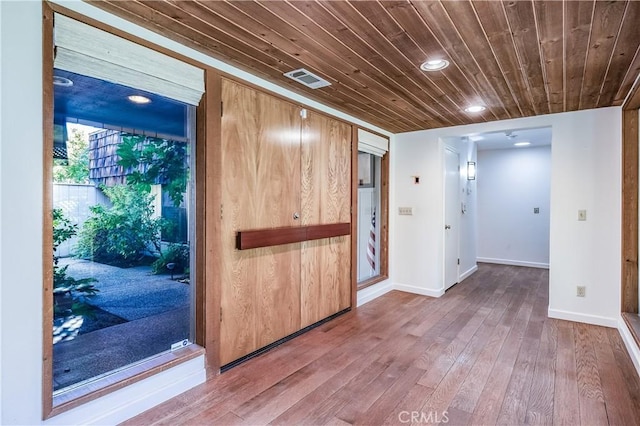 3715 W Birch Ave, Fresno, CA 93711 - empty room featuring wood ceiling, wood-type flooring, recessed lighting, and baseboards