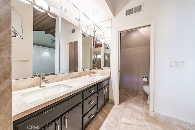 3715 W Birch Ave, Fresno, CA 93711 - full bath with double vanity, toilet, baseboards, and recessed lighting