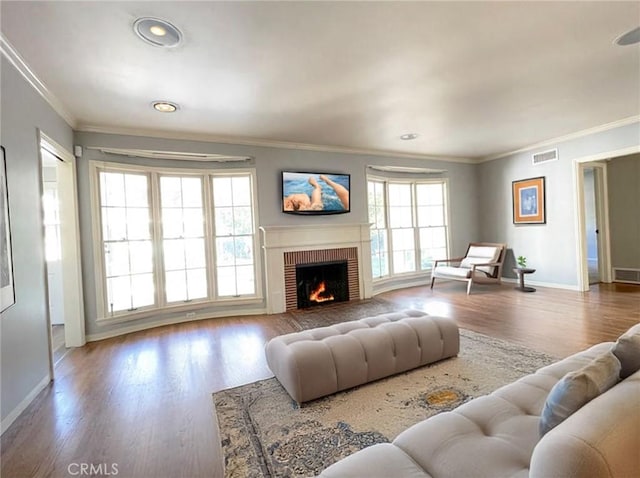 3275 N D St, San Bernardino, CA 92405 - living room featuring baseboards, ornamental molding, wood finished floors, a fireplace, and recessed lighting