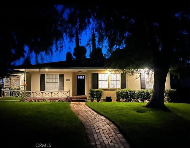 3275 N D St, San Bernardino, CA 92405 - ranch-style house with a lawn and covered porch