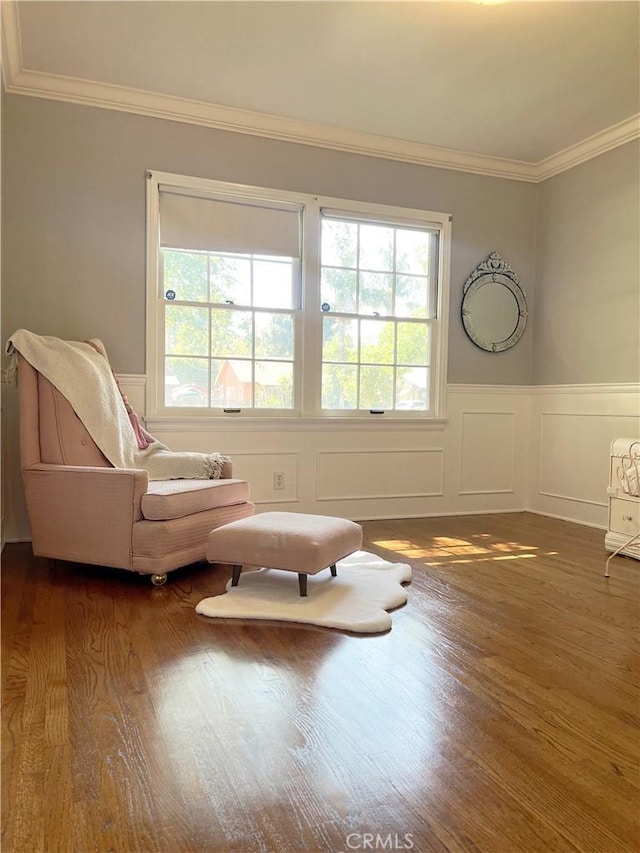 3275 N D St, San Bernardino, CA 92405 - sitting room featuring ornamental molding, wainscoting, wood finished floors, and a decorative wall