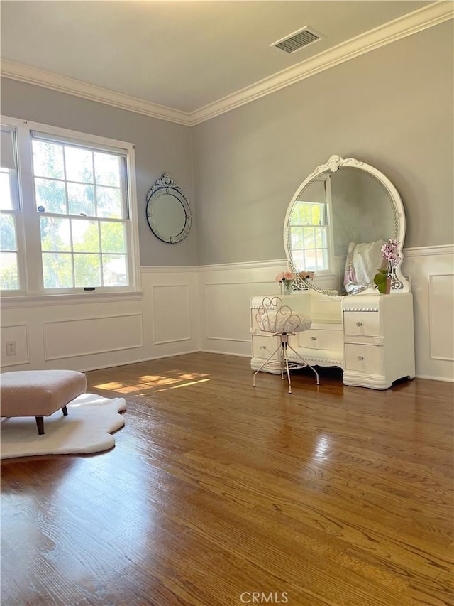 3275 N D St, San Bernardino, CA 92405 - living area featuring ornamental molding, a wainscoted wall, wood finished floors, and a decorative wall