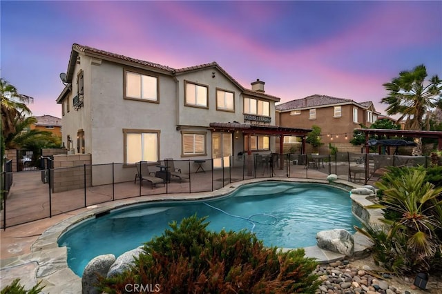 38161 Desert Hawk Dr, Palmdale, CA 93552 - pool at dusk featuring a pergola and a patio area