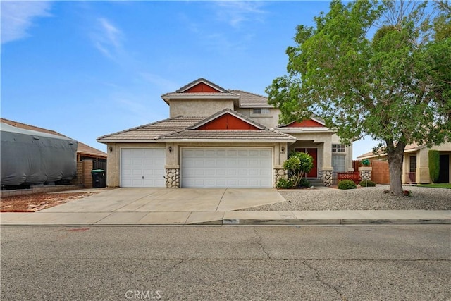3065 Conestoga Canyon Rd, Palmdale, CA 93550 - view of front of house with stone siding, stucco siding, an attached garage, driveway, and a tile roof
