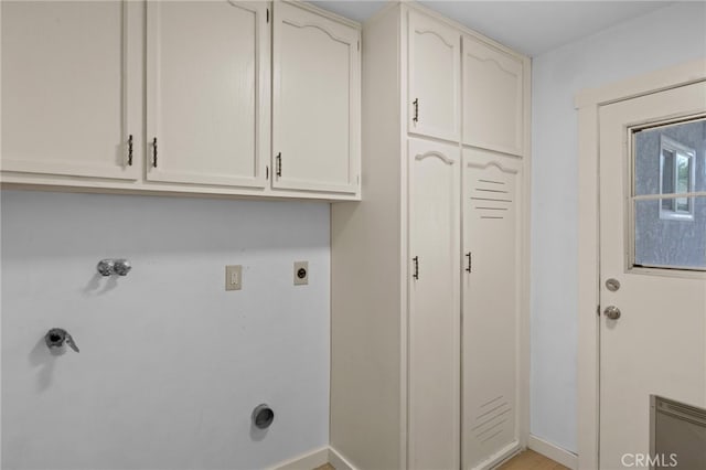 7010 Airway Ave, Yucca Valley, CA 92284 - washroom with cabinet space, hookup for an electric dryer, hookup for a washing machine, and baseboards