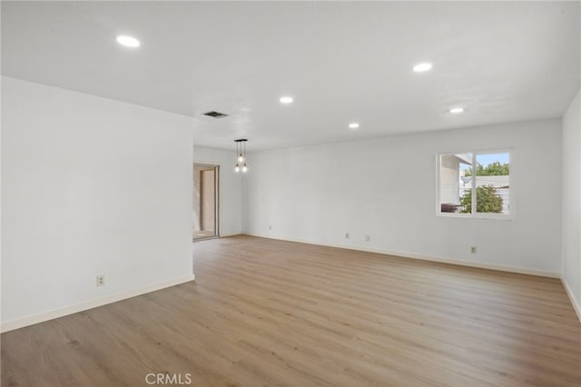 7010 Airway Ave, Yucca Valley, CA 92284 - spare room with light wood-style floors, recessed lighting, and baseboards