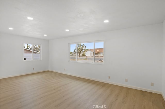7010 Airway Ave, Yucca Valley, CA 92284 - empty room featuring light wood-style flooring, recessed lighting, and baseboards