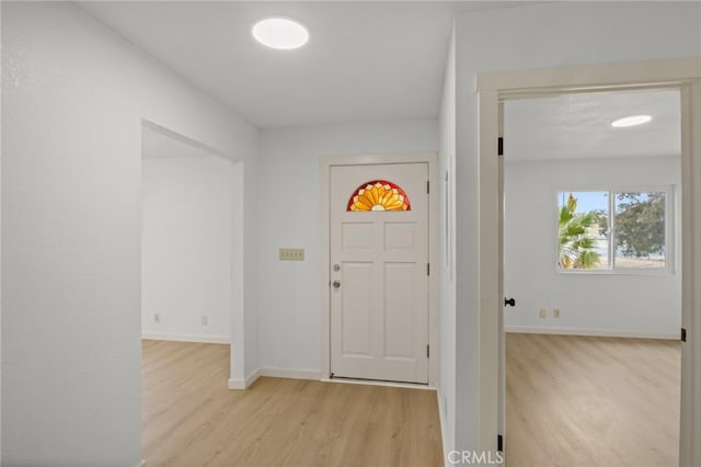 7010 Airway Ave, Yucca Valley, CA 92284 - foyer entrance with light wood-type flooring and baseboards